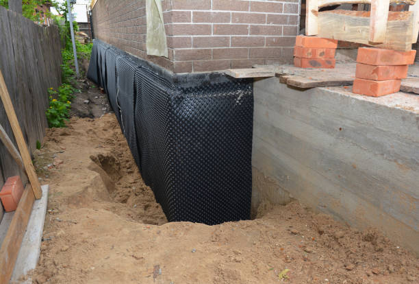 Happy homeowners after waterproofing job in Camp Hill